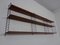 Schwedisches Wandregal aus Teak & Metall von Kajsa & Nils Nisse Strinning für String, 1950er 14
