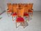 Orange Chairs by Joamin Baumann for Baumann, Paris, 1970s, Set of 12 2