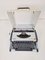 Vintage Traveller De Luxe Typewriter with Case by Olympia, 1970s 6