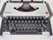 Vintage Traveller De Luxe Typewriter with Case by Olympia, 1970s 3