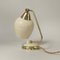 Tischlampe aus Messing, Opalglas & Bakelit, Deutschland, 1950er 9