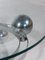 Mesa de centro Sputnik de metal cromado con esferas y superficie redonda de vidrio, Alemania, años 60, Imagen 9