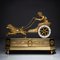 Empire Kaminuhr mit Putto in Chariot von Thiery À Paris 2