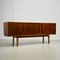 Rosewood and Teak Low Sideboard with Sliding Doors and Drawers, 1960s, Image 1