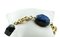 Armband aus 18 Karat Gold mit blauem und schwarzem Gestreiftem Achat und Rubinen 4
