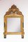 French Louis XVI Style Gilt Mirror with Crest, 1930s 1