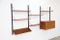 Vintage Royal System Wall Unit in Teak with Black Brackets by Poul Cadovius 1