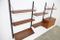 Vintage Royal System Wall Unit in Teak with Black Brackets by Poul Cadovius 12