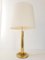 Lámpara de mesa ajustable de latón dorado, años 70, Imagen 1