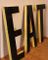 Large Vintage French Industrial Black & Yellow Lacquered Metal EAT Letter Set, 1950s 2