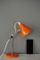 Lámpara de escritorio pequeña en naranja de metal cromado, años 50, Imagen 13