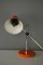 Lámpara de escritorio pequeña en naranja de metal cromado, años 50, Imagen 11