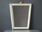 Large Mid-Century Modern Illuminated Mirror with Perforated Metal Frame and Brass Details 1