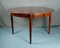 Rosewood Round Extendable Dining Table from Lübke, 1960s, Image 1