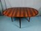Rosewood Round Extendable Dining Table from Lübke, 1960s 7
