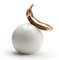 Gold Banana on a White Ball Skulptur von StudioKahn 1