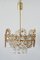 Gilt Brass Facet Cut Crystal Glass Chandelier from Palwa, 1970s 6
