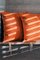 Gemustertes Kissen aus Rindsleder in gebranntem Orange mit Lederriemen am Reißverschluss von Casa Botelho 4
