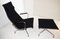 Model EA124 Swivel Chair with EA125 Footrest by Charles & Ray Eames by Vitra, 1950s 1