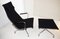 Model EA124 Swivel Chair with EA125 Footrest by Charles & Ray Eames by Vitra, 1950s, Image 1