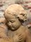 Sculpture d'Anges se Battant Antique en Terracotta 9