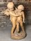 Sculpture d'Anges se Battant Antique en Terracotta 1