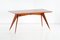 Italian Walnut and Brass Dining Table by Melchiorre Bega, 1950s, Image 1