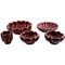 Red Rubin Pottery with Red Glaze with by Gold Upsala-Ekeby for Gefle, 20th Century, Set of 4 1