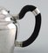 Antique Teapot in Hammered Silver with Handle in Ebony from Georg Jensen 5