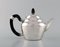 Antique Teapot in Hammered Silver with Handle in Ebony from Georg Jensen 2