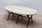 Brutalist Wrought Iron Travertine Oval Top Coffee Table, 1960s 2