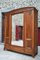 Antique French Art Nouveau Wardrobe in Carved Walnut with Blooming Shrubs Theme by Louis Majorelle 1