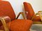 Orangefarbene Mid-Century Armlehnstühle mit Kunststoff Armlehnen von Tatra Nabytok, 1960er, 2er Set 2