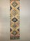 Vintage Turkish Black, Pink, and Beige Distressed Woolen Tribal Runner Rug, Image 1