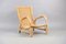 Vintage Rattan Lounge Chair from Arco 1