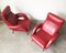 Mid-Century Red Faux Leather and Iron Lounge Chairs Attributed to Carlo de Carli, Set of 2 3