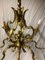 Lámpara de araña de bronce con ocho brazos, años 20, Imagen 4