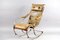 Antique Leather and Metal Rocking Chair by Peter, Cooper for R.W. Winfried 12