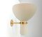 Cream colored metal and brass diabolo shaped wall lamp, 1960s, Image 1