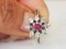 Daisy Ring in 750/1000 Gray Gold with a Ruby and Diamonds 4