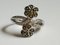 Silver Ring Decorated with Floral Motifs with Green Diamonds 1