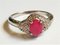 Ring with Oval Ruby ​​in a Circle of Diamonds 5