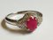 Ring with Oval Ruby ​​in a Circle of Diamonds, Image 1