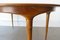 Extendable Round Walnut and Brass Dining Table by José Cruz de Carvalho for Altamira, 1950s 17