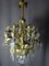 Golden Bronze Chandelier With Winged Sphinxes 1