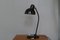 Lampada da scrivania modello 6551 Bauhaus nera di Christian Dell per Kaiser Idell / Kaiser Leuchten, anni '30, Immagine 1