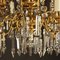 Französischer Louis XVI Kronleuchter mit 12 Leuchten aus vergoldeter Bronze & geschliffenem Kristallglas, 19. Jh 5
