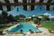 Poolside in Sotogrande Oversize C Print Framed in White by Slim Aarons, Immagine 2