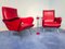 Mid-Century Italian Red Vinyl Lounge Chairs in the Style of Nino Zoncada, 1950s, Set of 2 2