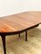 Mid-Century Modern Round Extendable Rosewood Dining Table by Ib Kofod Larsen for Faarup Møbelfabrik, 1960s 7